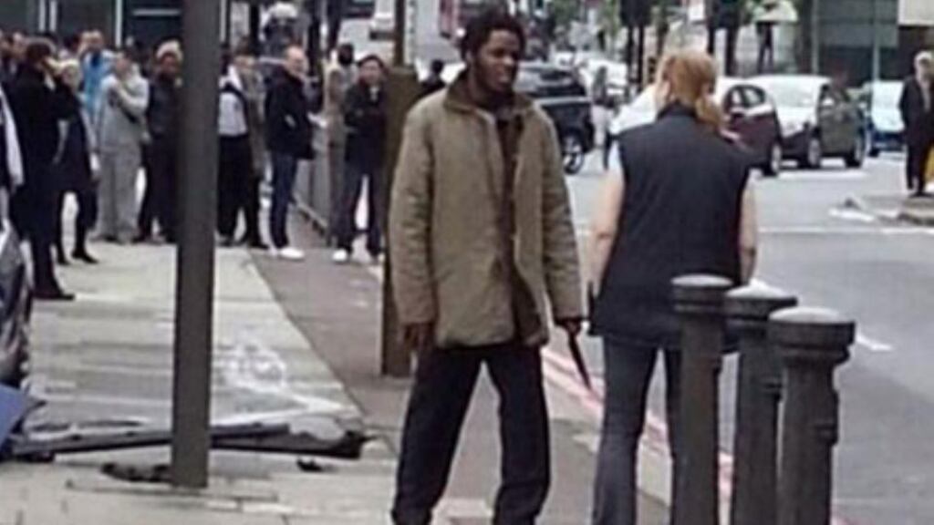 Ingrid Loyau-Kennett speaks to one of the two men arrested at the scene of the Woolwich murder yesterday.