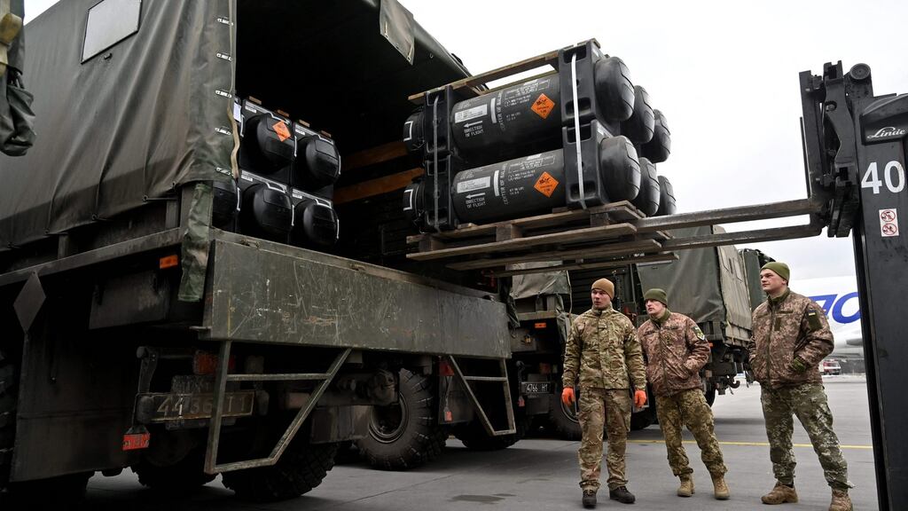 Ukrainian servicemen load a truck in Kyiv with the FGM-148 Javelin, an American anti-tank missile provided by the US to Ukraine. Photograph: Sergei Supinsky/AFP via Getty Images