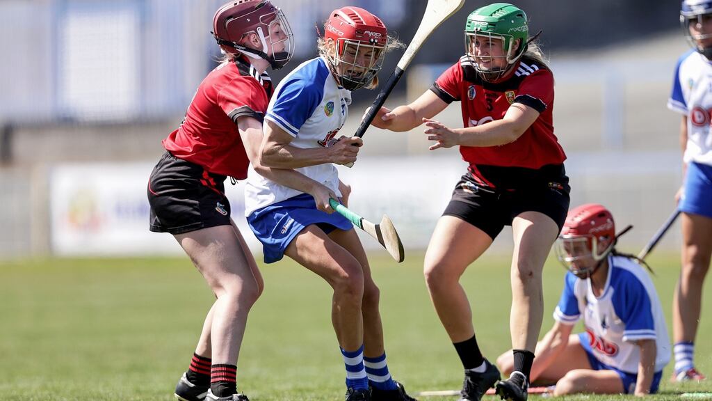 Waterford’s Beth Carton, and Aoife Keown and Deirbhla Savage of Down in action at Walsh Park. Photograph: Laszlo Geczo/Inphoo