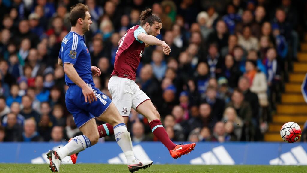 Andy Carroll scores for West Ham at Stamford Bridge on Saturday. Photograph: John Sibley/Reuters