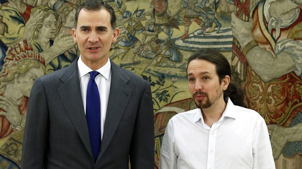 Spanish king Felipe VI (left)  with the leader of left-wing  party Podemos, Pablo Iglesia. Photograph: Angel Diaz /AFP/Getty Images