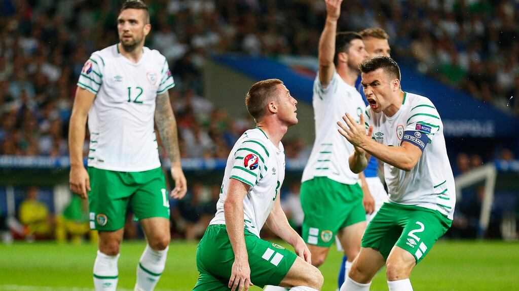 Republic of Ireland captain Séamus McCarthy commends team-mate James McCarthy during the victory over Italy at Stade Pierre Mauroy in Lille on Wednesday. photograph: Laurent Dubrule/EPA