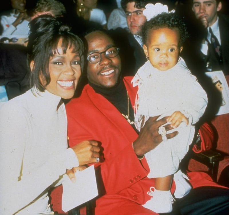 Whitney Houston with Bobby Brown and their daughter, Bobbi Kristina, in 1994. Photograph: Getty