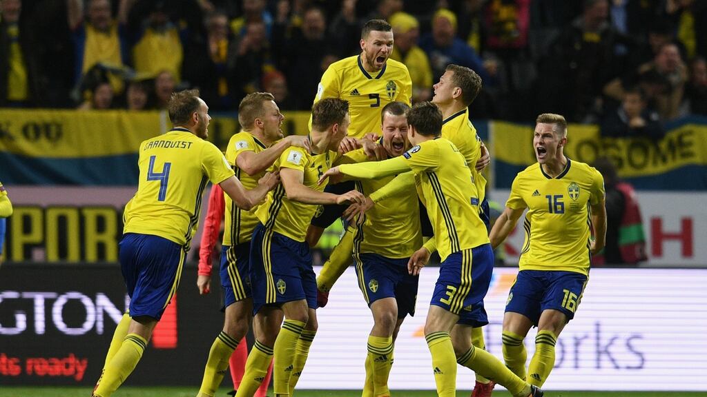 Swedish players celebrate Jakob Johansson’s goal in the World Cup playoff first leg match against Italy at Friends Arena in Solna, Sweden. Photograph: Claudio Villa/Getty Images