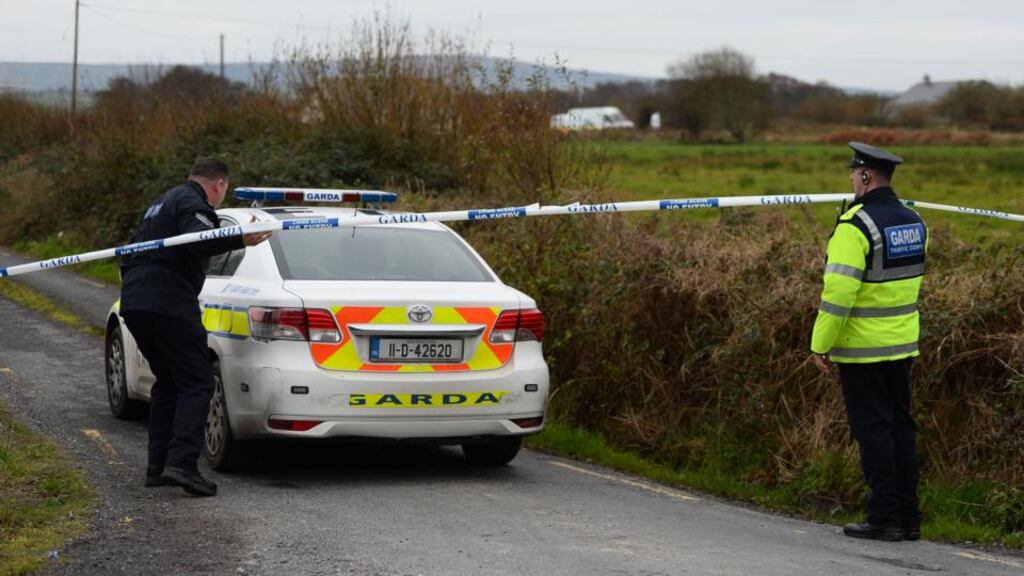 Garda near a house where the body of a woman was found in Lixnaw, Co Kerry today. Photograph: Domnick Walsh