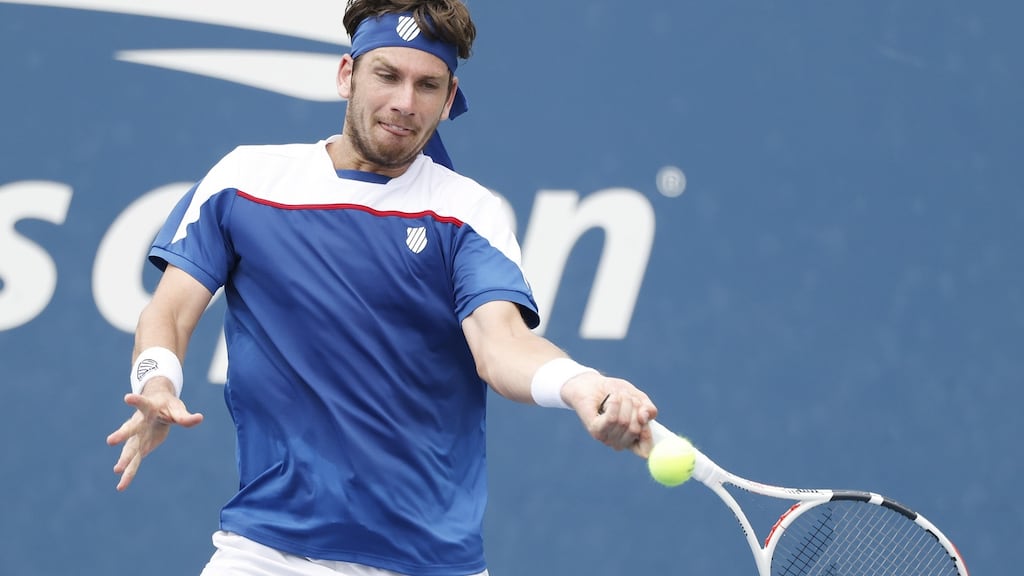Britain’s Cameron Norrie hits a return to Diego Schwartzman of Argentina during their first-round match at the US Open in Flushing Meadows, New York. Photograph: Jason Szenes/EPA