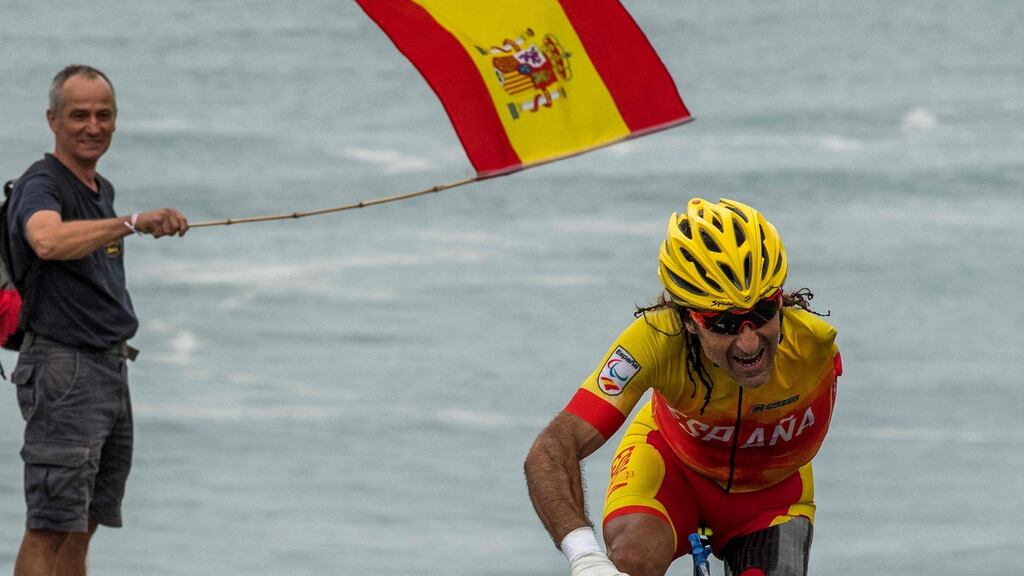 Juan José Méndez Fernández of Spain competes in the road race C1-2-3 during the Paralympic Games in Rio. Photograph: Anthony Edgar for OIS/IOC/AFP/Getty Images