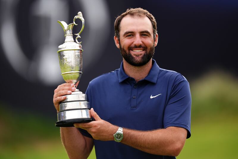 Scottie Scheffler celebrates with the Claret Jug at Royal Portrush. Photograph: Mike Egerton/PA Wire