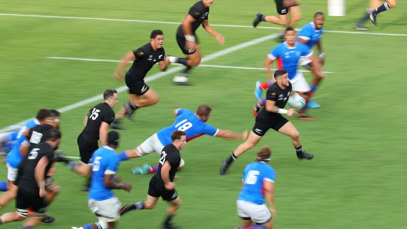 New Zealand’s TJ Perenara makes a break to score his side’s 11th try against Namibia at Tokyo Stadium. Photograph: Warren Little/World Rugby/World Rugby via Getty Images