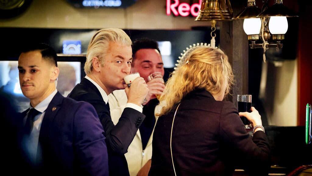 Dutch far-right leader Geert Wilders drinks a beer in a cafe in Volendam on Friday, after he resumed electioneering following a scare over his security. Photograph: Remko de Waal/EPA