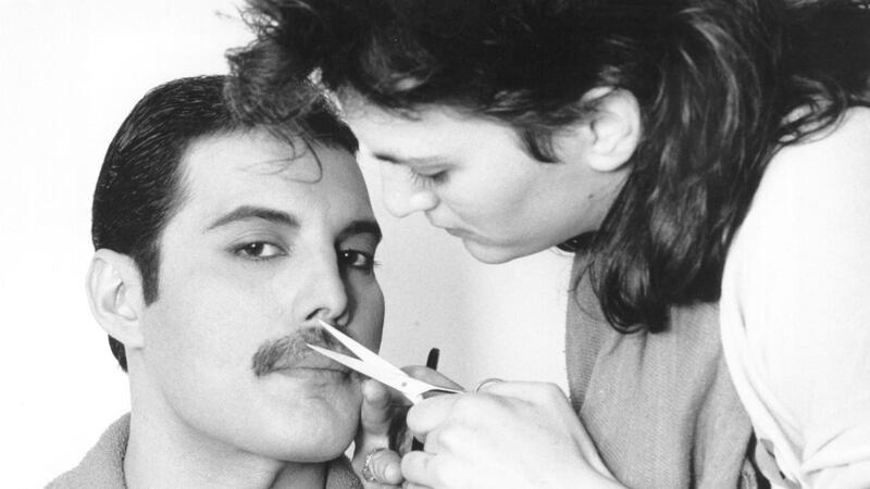 Freddie Mercury gets his moustache groomed, circa 1982. Photograph: Steve Wood/Express/Getty Images