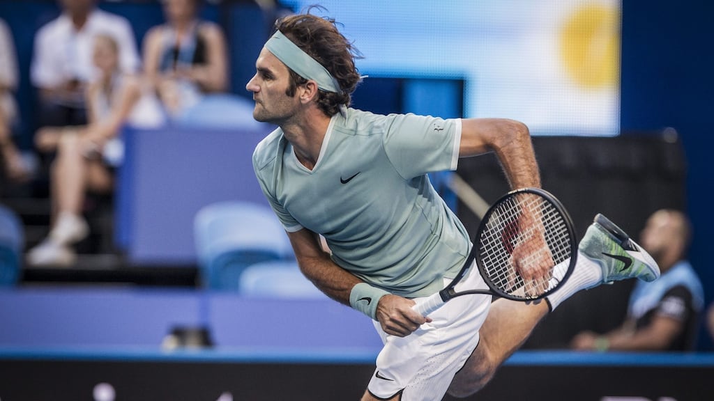 Roger Federer made a winning return to action in the Hopman Cup, beating Great Britain’s Dan Evans in straight sets in Perth. Photograph: Epa/Tony McDonagh