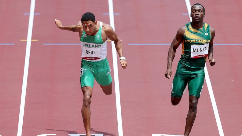 Leon Reid crosses the line to qualify for the 200m semi-finals. Photo: Bryan Keane/Inpho