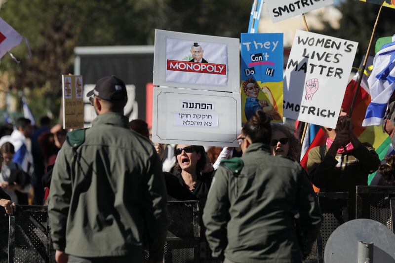 Israelis protest against the new coalition outside the Knesset. Photograph: Abir Sultan/EPA