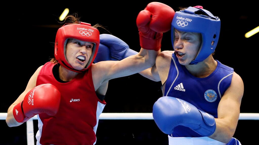 Katie Taylor fighting with Russia’s Sofya Ochigava during the women’s lightweight final at the London 2012 Olympic Games. Photograph: Scott Heavey/Getty Images.
