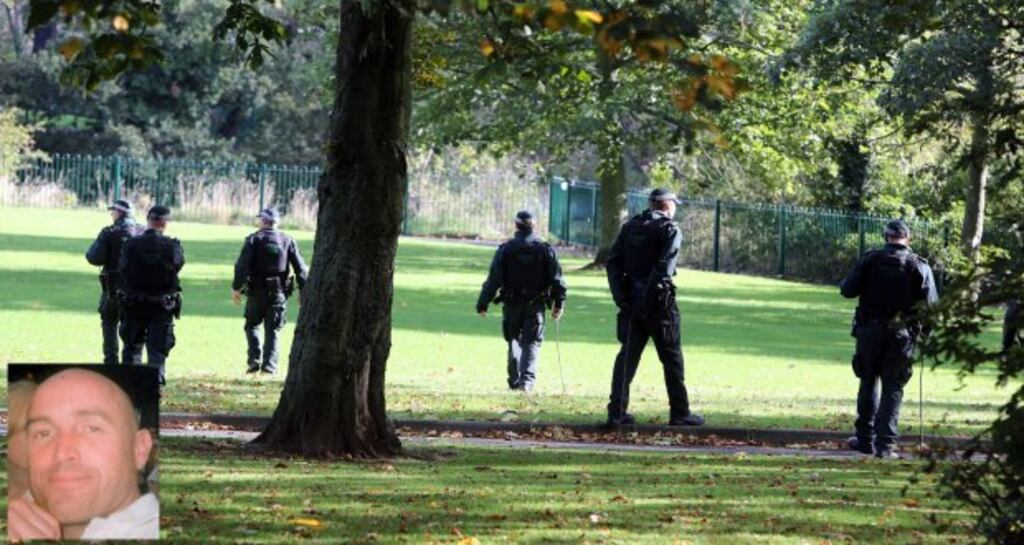 Police at the scene in Alexander Park, north Belfast, where the body of father-of-four Kevin Kearney (inset) was found. Photograph: Paul Faith/PA Wire