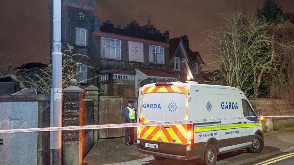Gardaí at the property on the Boreenmana Road, Cork city, where the man’s body was found. Photograph: Daragh Mc Sweeney/Provision
