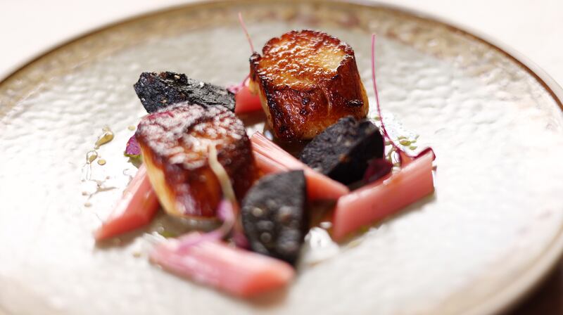 Three pieces of scallop (€16), have been nicely caramelised on one side and served with three smaller pieces of black pudding. Photograph: Laura Hutton/The Irish Times
