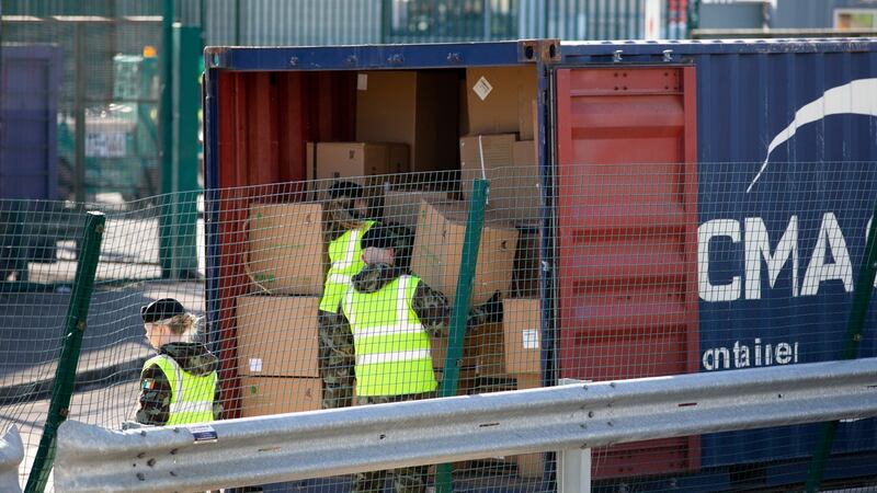 Army personnel pack the cargo from China. Photograph: Tom Honan/Irish Times.