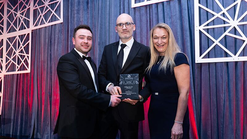 Ben Molloy, entries lead, Business River, presents the building of the year – educational to Nigel Murray and Penny Linton, Todd Architects