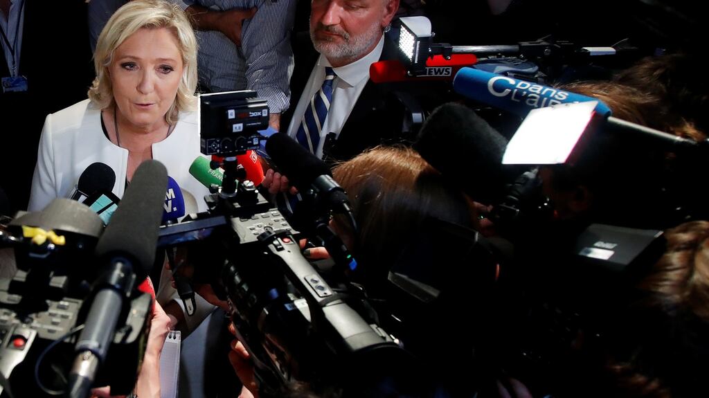 French far-right National Rally (Rassemblement National) party leader Marine Le Pen: has ditched the idea of scrapping the euro and exiting the EU. Photograph: Charles Platiau/Reuters