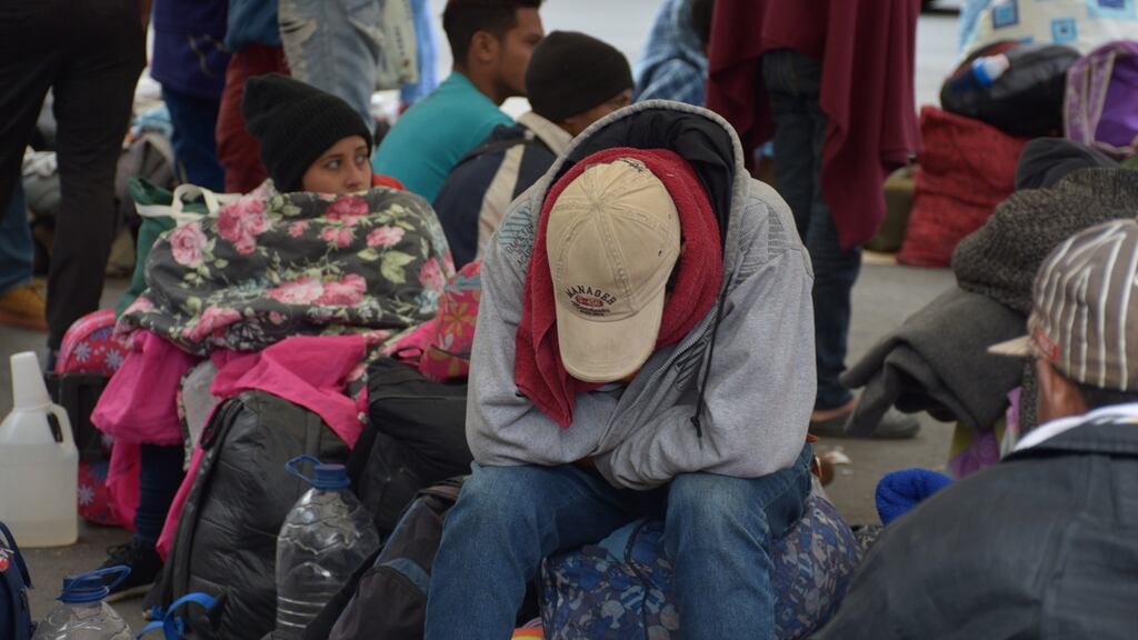 Venezuelan immigrants await a response from the authorities to enter Ecuador without a passport. Photograph: EPA/MARIA PAULA GOYES