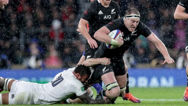 Retallick is tackled by Courtney Lawes during last week’s win over England. Photo: Billy Stickland/Inpho
