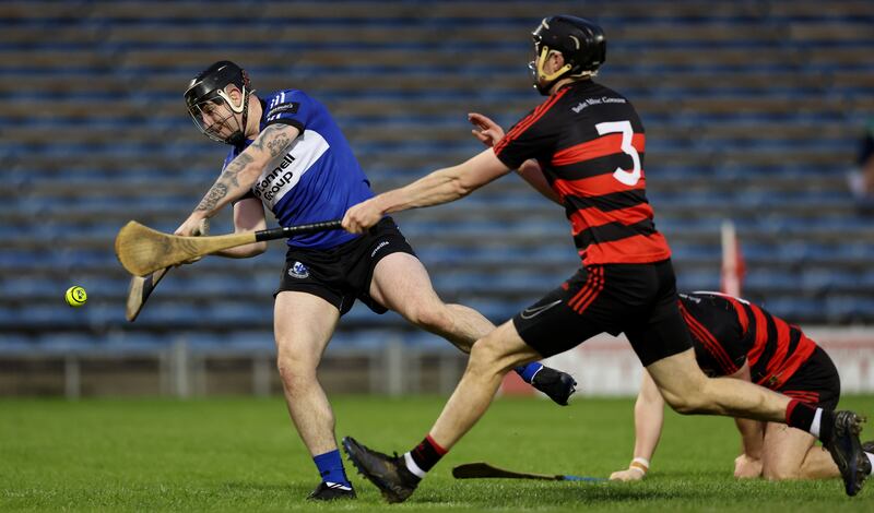 Sarsfields’ Shane O'Regan scores his side's second goal. Photograph: James Crombie/Inpho