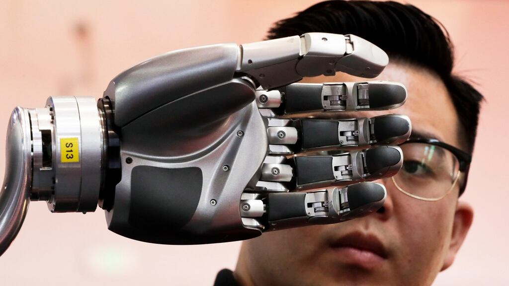Recent advances in AI are expected to lower the cost of using data and make predictions. Photograph: AP Photo/Andy Wong