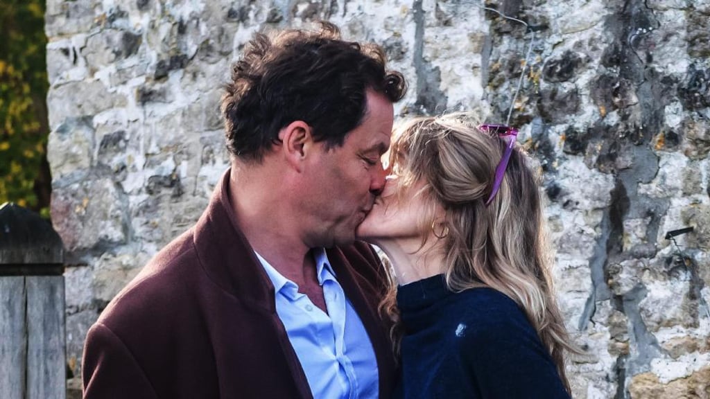 Actor Dominic West and wife Catherine FitzGerald in a public display of affection outside their home in the Cotswolds after West was seen kissing actor Lily James in Rome. Photograph: GlosPics/MEGA/GC Images