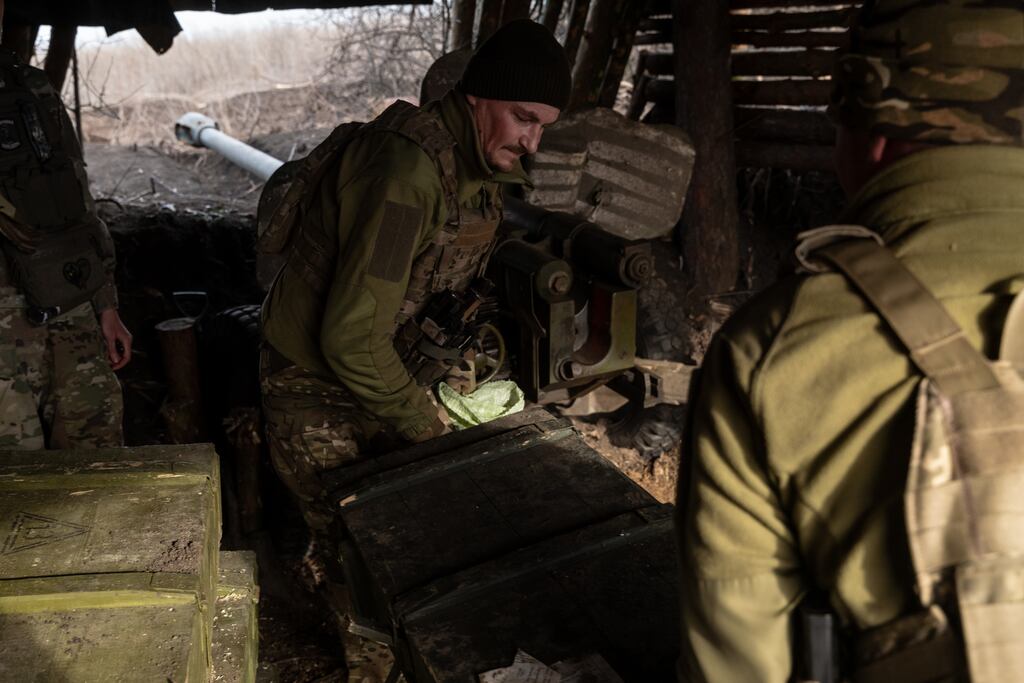 Ukrainian soldiers preparing to move a howitzer in the Kharkiv region of Ukraine. Photograph: Nicole Tung/The New York Times