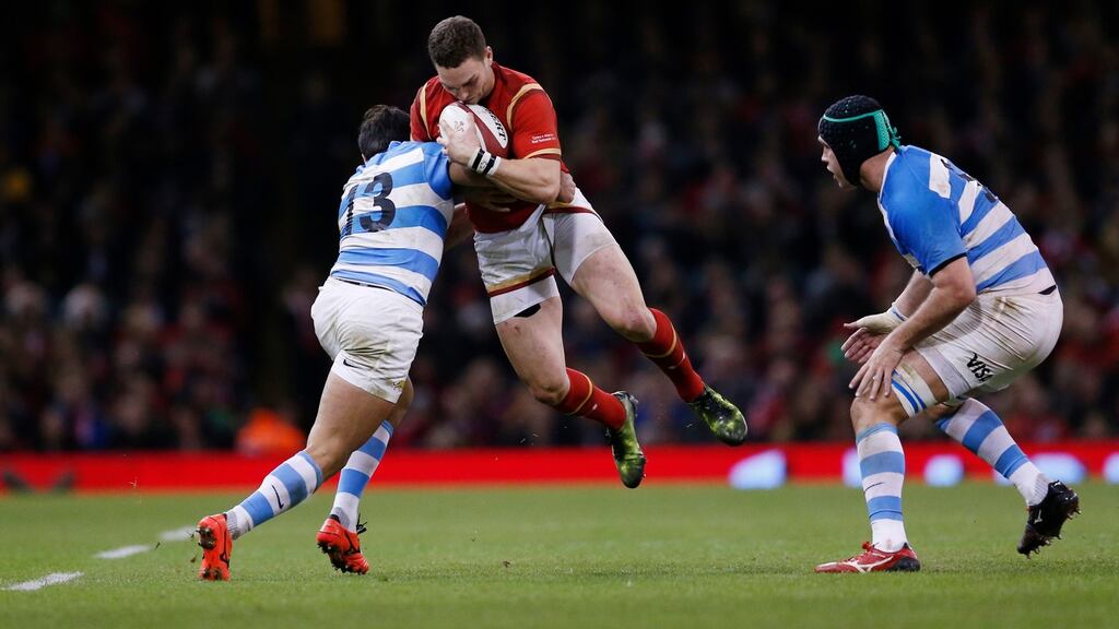 Wales’ George North in action with Argentina’s Matias Orlando. Photo: Andrew Boyers/Reuters