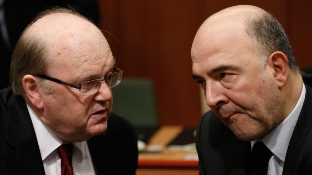 Minister for Finance Michael Noonan and EU commissioner in charge of economic and financial affairs Pierre Moscovici: the latest exemplar of the exception française has triggered a backlash around the zone, as smaller countries bemoan the application of double standards in the case of France. Photograph: Julien Warnand/EPA