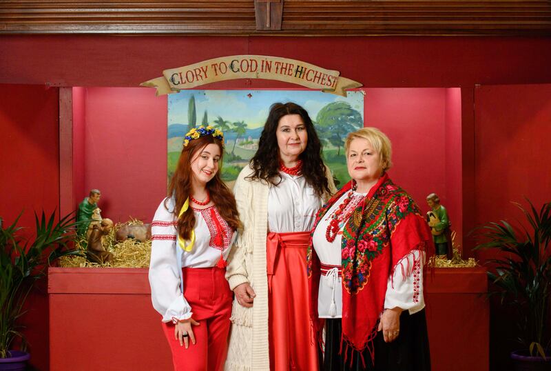 Svetlana and her daughter Valeria Deikuv with Valentina Grishenko from the Ukrainian choir. Photograph: Daragh Mc Sweeney/Provision