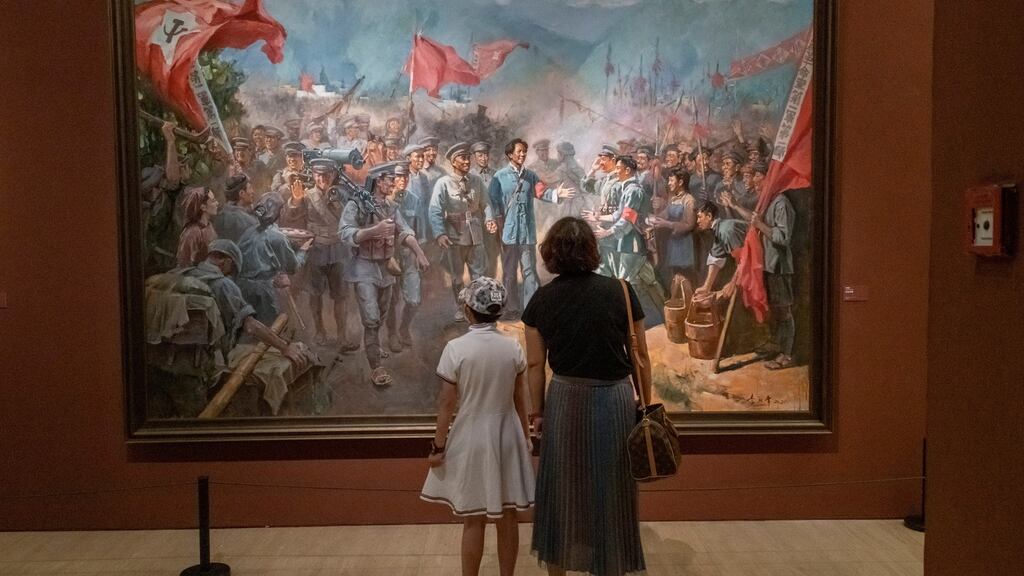 A painting showing Mao with Red Army soldiers and officers at the National Art Museum in Beijing during the exhibition ‘100 Years Toward Greatness’ on June 30th, 2021.  Photograph: Gilles Sabrié/New York Times