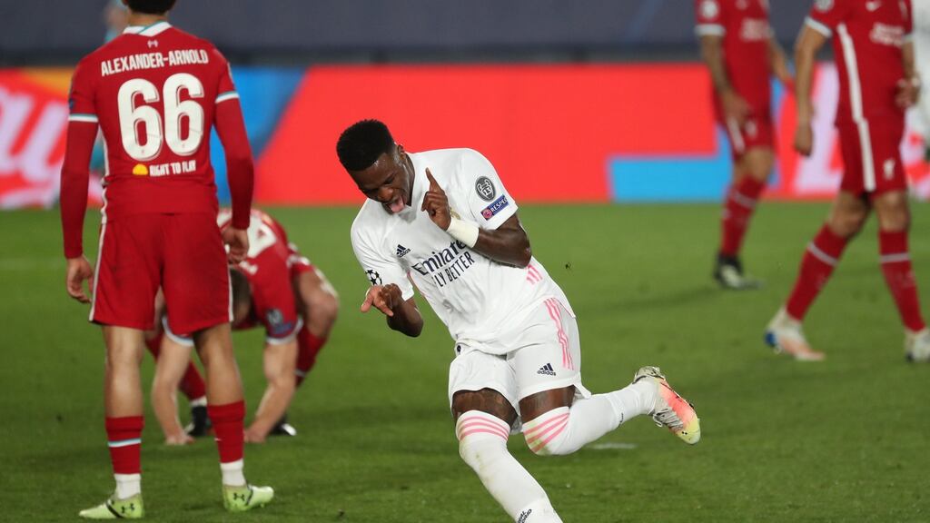 Real Madrid’s striker Vinicius Jr celebrates after scoring his side’s third  goal during the Champions League quarter-final first leg at Alfredo Di Stefano stadium in Madrid. Photograph: Kiko Huesca/EPA