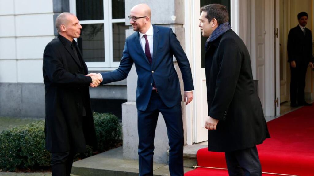 ‘Incumbent centre-right governments across Europe know that facilitating a positive outcome for the new Greek government will not assist their own prospects of re-election.’ Above, Belgian Prime Minister Charles Michel welcomes Greek Finance Minister Yanis Varoufakis and Prime Minister Alexis Tsipras ahead of a meeting in Brussels on February 12th. Photograph: REUTERS/Francois Lenoir