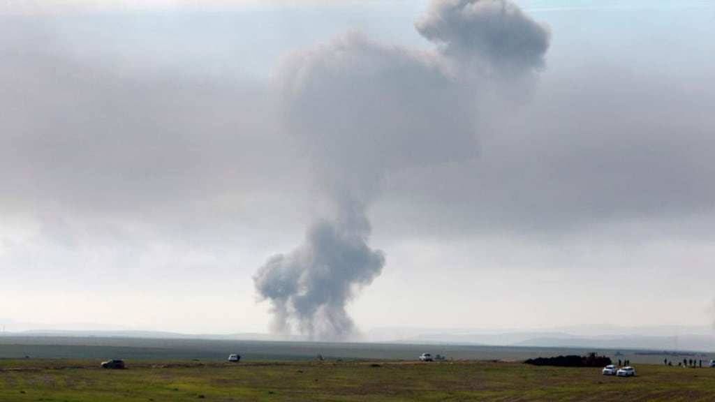 Smoke rises during skirmish between Kurdish forces and IS in Mosul, Iraq. The US reports that Islamic State chemical weapons experts Abu Malik was killed in the area during an airstrike. Photograph: Azad Lashkari/Reuters