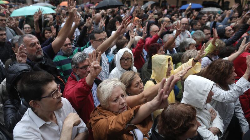People wait to cast their ballot in the referendum vote at Escola Industrial of Barcelona school polling station. Photograph: Chris McGrath/Getty Images