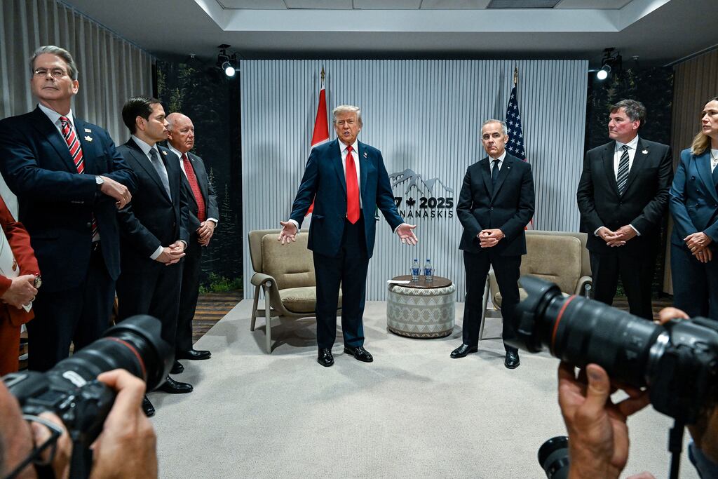 Donald Trump meets Canadian prime minister Mark Carney at the G7 Summit. Photograph: Kenny Holston/The New York Times