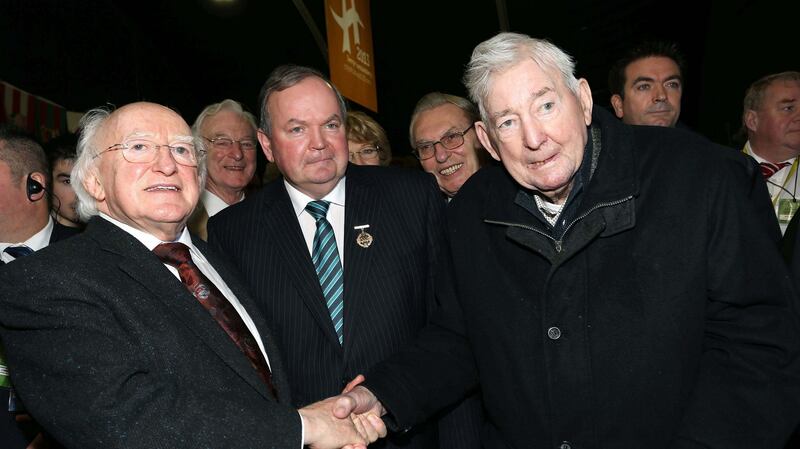 Former GAA president Paddy McFlynn (right) with fellow former GAA president Liam O’Neill and president of Ireland Michael D Higgins in 2013. Photograph: Lorcan Doherty/Inpho
