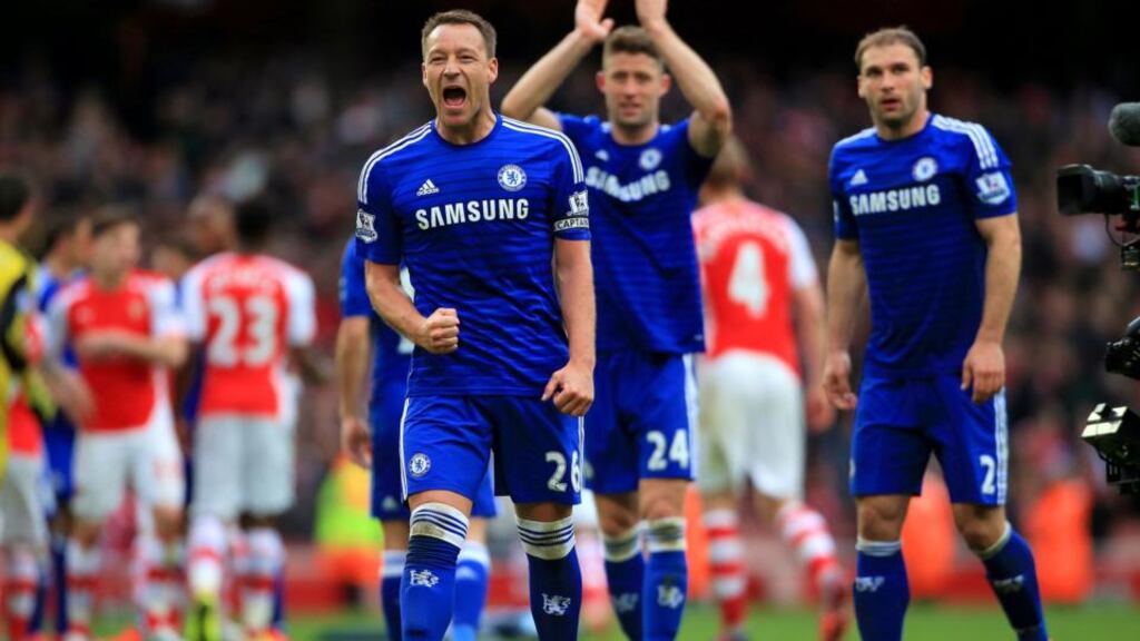 Chelsea captain John Terry celebrates his side being a point closer to the Premier League title at the final whistle of Chelsea’s clash with Arsenal at the Emirates yesterday. Photograph: Nick Potts/PA Wire