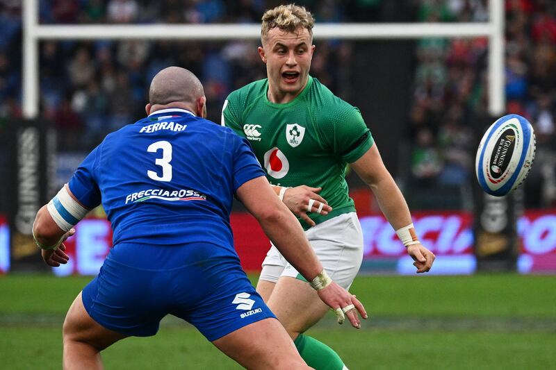 Italy's tighthead prop Simone Ferrari and Ireland's scrumhalf Craig Casey fight for the ball. Photograph: Vincenzo Pinto/AFP