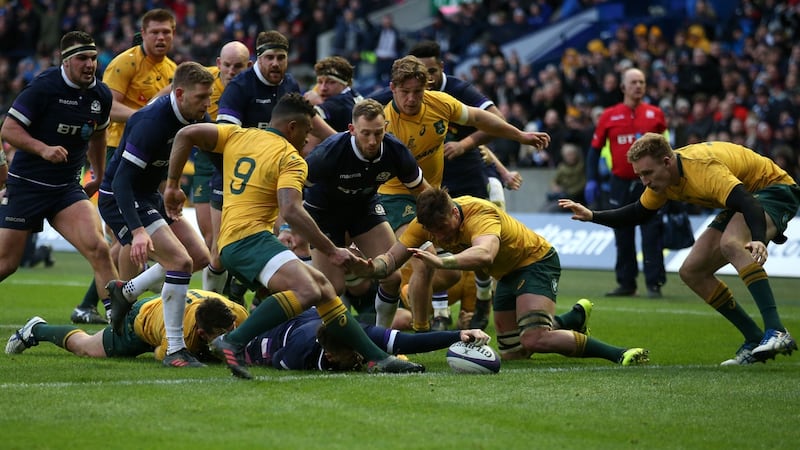 Scotland’s Ali Price dives in to score at the end of the first half. Photograph: Andrew Milligan/PA Wire.