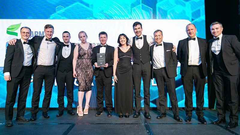 Denis Coll, Biopharm Sector Manager Ireland, Watson-Marlow Fluid Technology Group presents the Innovation of the Year award to the Eli Lilly Kinsale team.