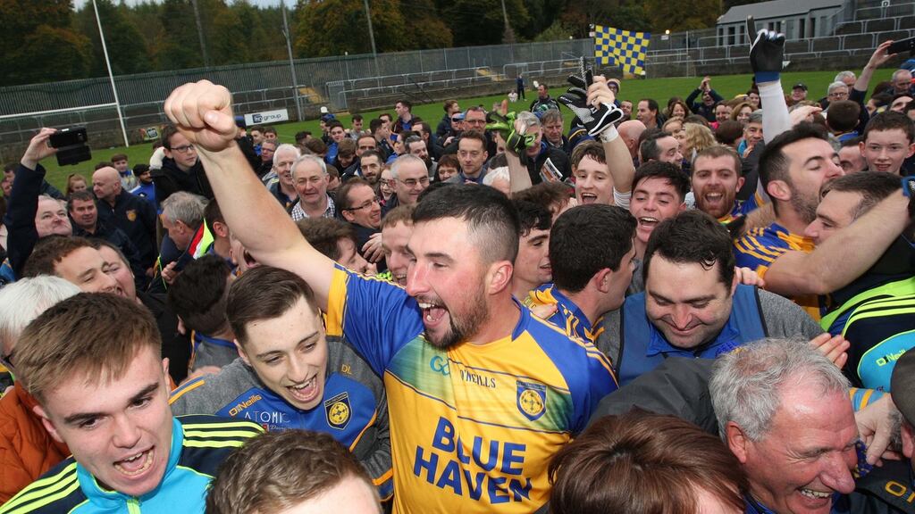 Kilcar players and supporters celebrate at the final whistle of their Donegal SFC final. Photo: Lorcan Doherty/Inpho