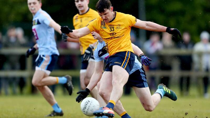 DCU’s Diarmuid Murtagh scores his side’s goal against UCD in the Sigerson Cup quarter-final. Photograph by James Crombie/Inpho