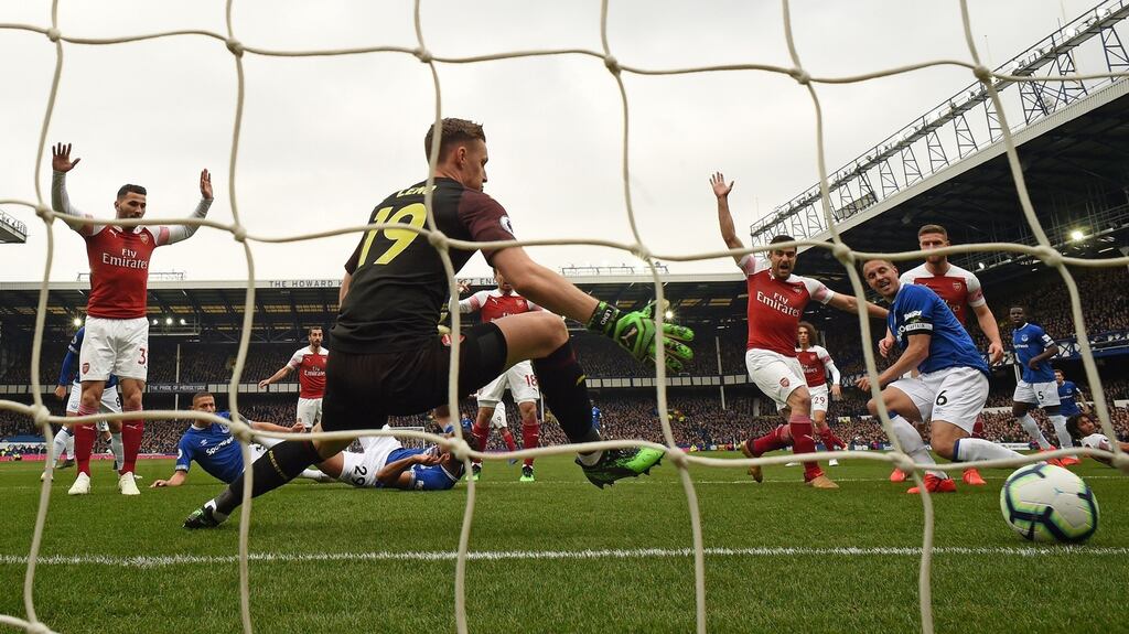 Everton’s Phil Jagielka  scores the opening goal past Arsenal goalkeeper Bernd Leno during the  Premier League  match  at Goodison Park. Photograph:  Oli Scarff/AFP/Getty Images