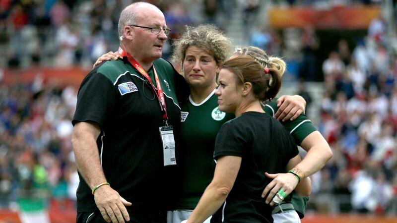 Ireland’s head coach Philip Doyle with Jenny Murphy, Lynne Cantwell and Niamh Briggs after the defeat to France. Photograph: Dan Sheridan / Inpho