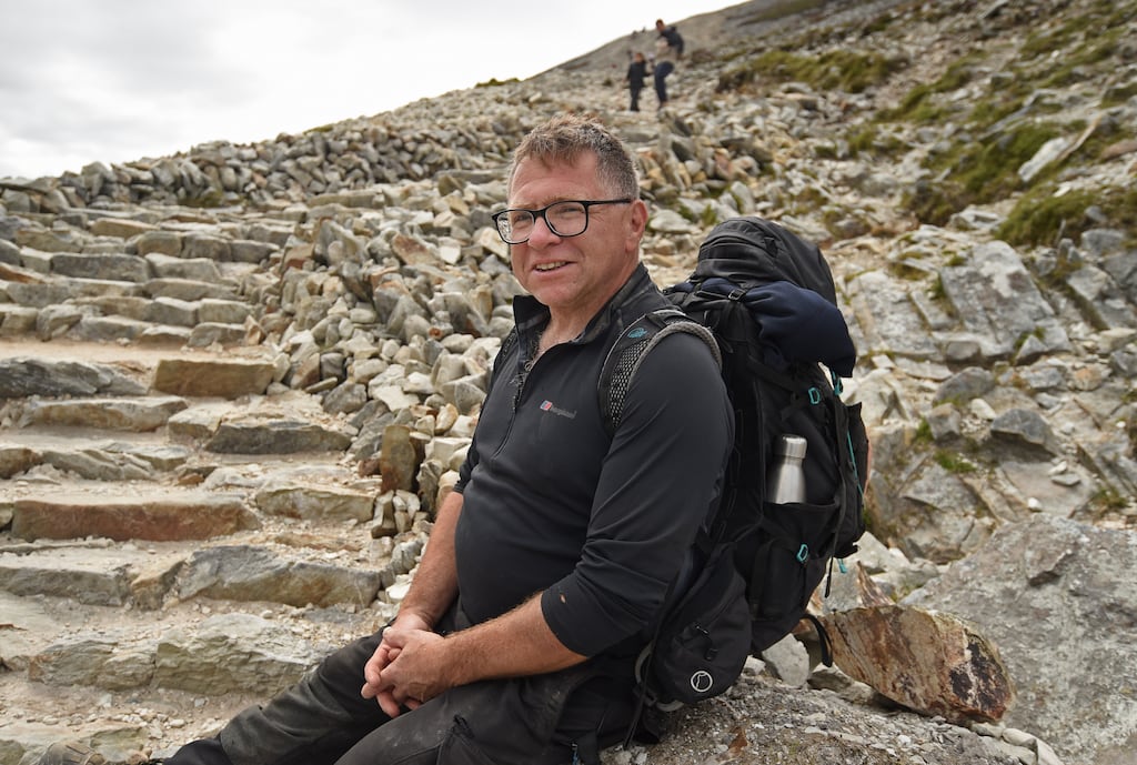 Matt McConway, leader of the team that builds paths to the summit, on his way down Croagh Patrick after another day of work. Photograph: Conor McKeown